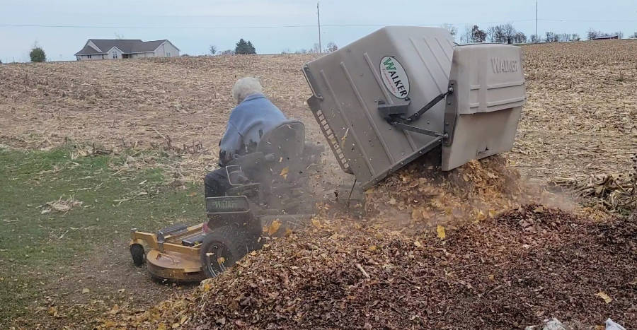 Dolly loves the automatic Walker Power Dump on her 48-inch grass-catching Walker. “I could never get on and off the mower over and over to keep emptying the catcher box these days,” she says.